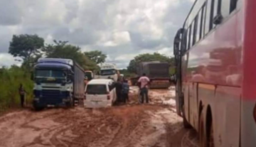 The road from Mokambo to Mufulira is a rainy mess of trucks and traffic getting stuck in deep mud.