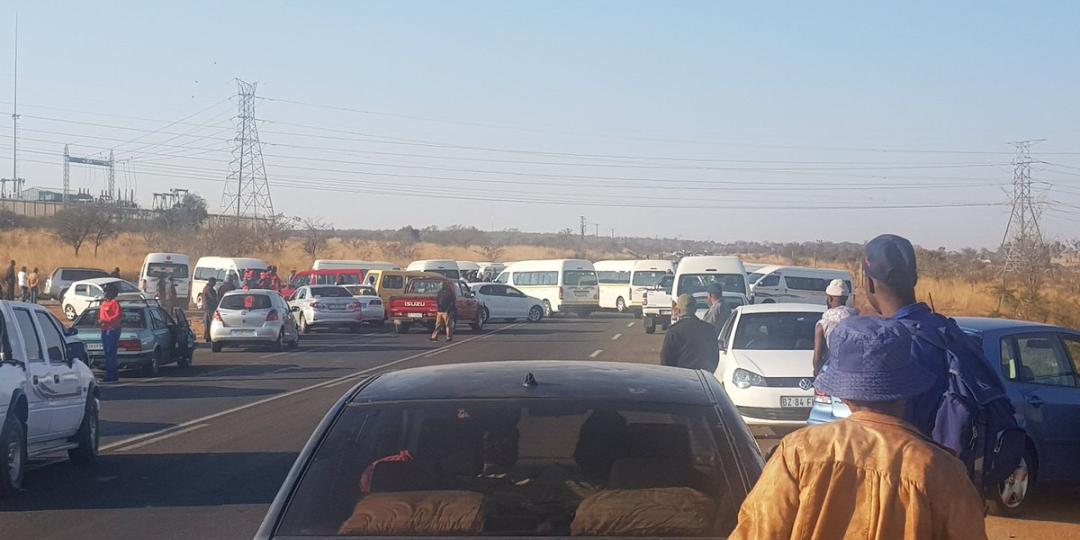 Taxis blocking a road in Soshanguve.