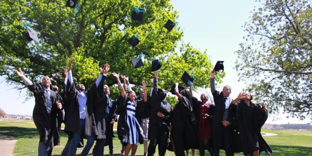 The 18 graduates celebrating the completion of their course.