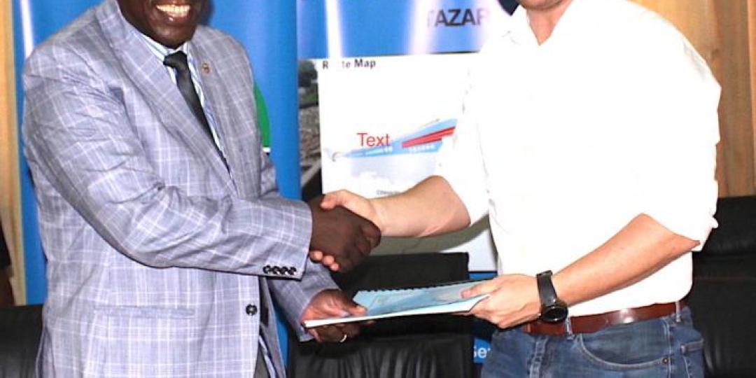 Tazara managing director Bruno Ching’andu and DCG CEO Jesper Sorenson.