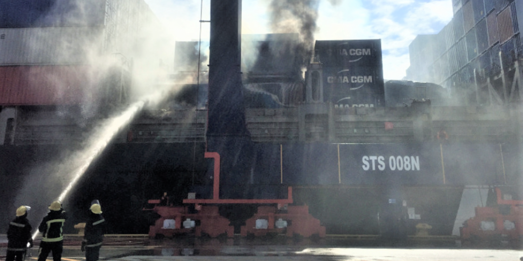 Fire fighters battled to contain a liquefaction fire on board the APL Austria in the Port of Ngqura in 2017.