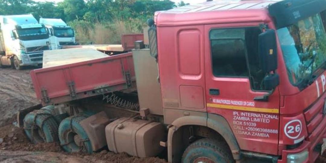  A truck stuck in impenetrable mud on the Mokambo road to the east of the DRC’s Kasumbalesa crossing into Zambia. 